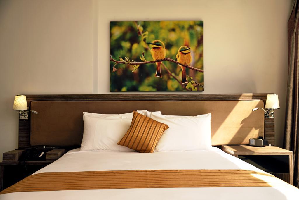 Golden Tulip Dar Es Salaam City Center Hotel Habitación foto